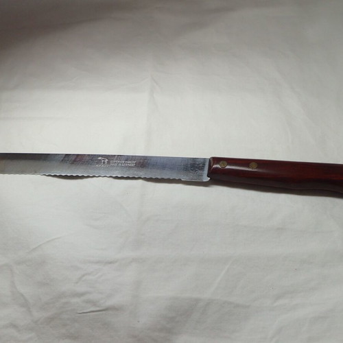 Okapi vintage bread knife 100% authentic like new, made in Germany