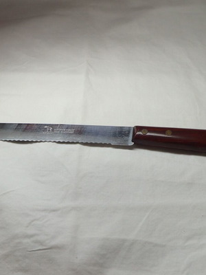 Okapi vintage bread knife 100% authentic like new, made in Germany