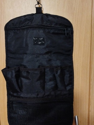Men's toiletry bag like new, black, with compartments and zippers