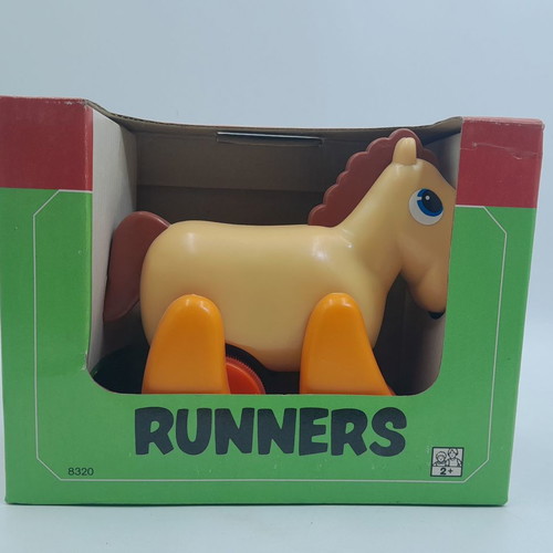 TOMY Runners pull back horse toy used