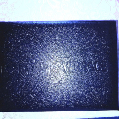 Versace vintage leatherette box like new