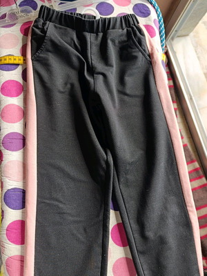 Sportswear like new, black with pink stripe, size 128 cm