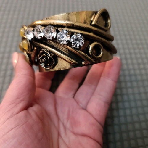 Vintage bracelet used in bronze, green and mustard shades