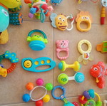 Set of 32 baby rattles including plush toys and large dice