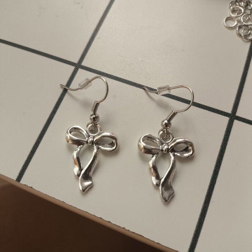 Silver Bow Earrings handmade with plastic stoppers