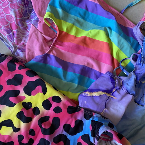 Girls' swimsuits like new, pack of 4, ages 7-9