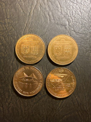 Set of 4 collectible metal medals from Hamburg Germany, new