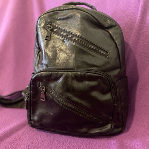 Black backpack bag made of leatherette with many pockets like new