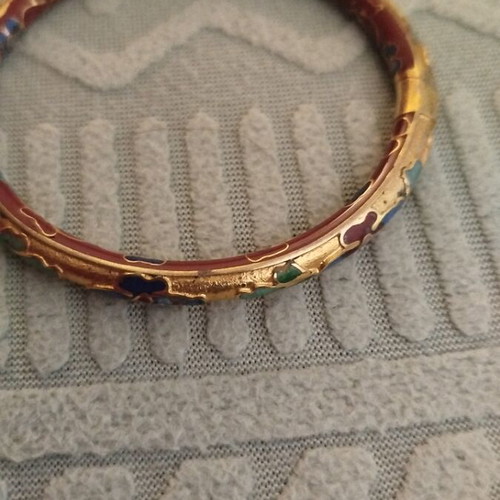 Metal bracelet with unique colorful designs like new