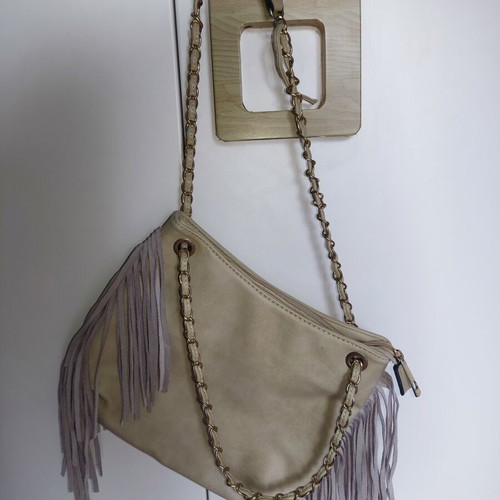 Shoulder bag with fringes and gold details, like new, beige suede leather