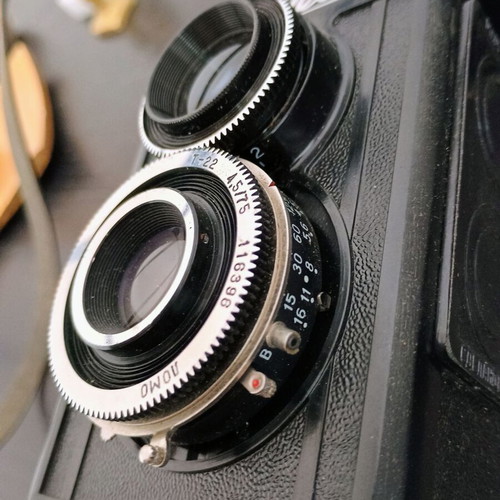 Lubitel 2 camera used with black leather case