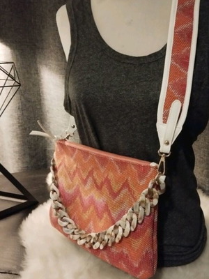 Crossbody and clutch bag in orange shades like new