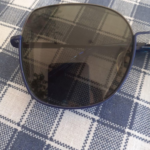 Sunglasses used in blue shade with metal frame