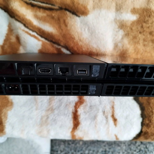 PlayStation 3 slim and PlayStation 4 consoles for repair or parts used