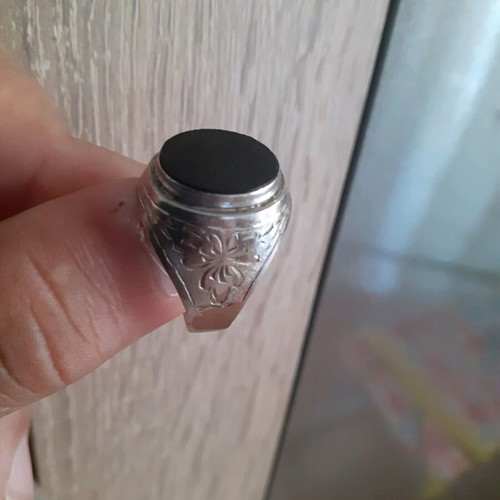 Silver ring with black stone like new