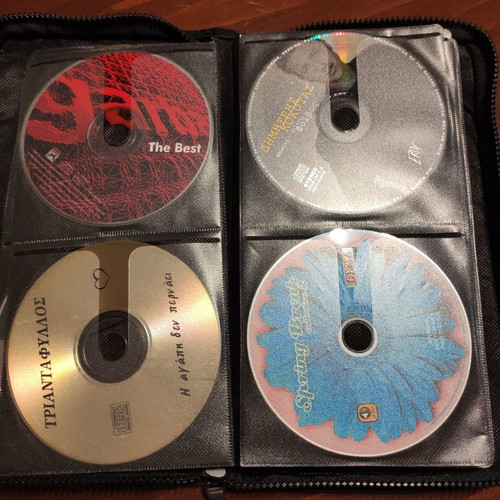 Set of 48 used music CDs with free case