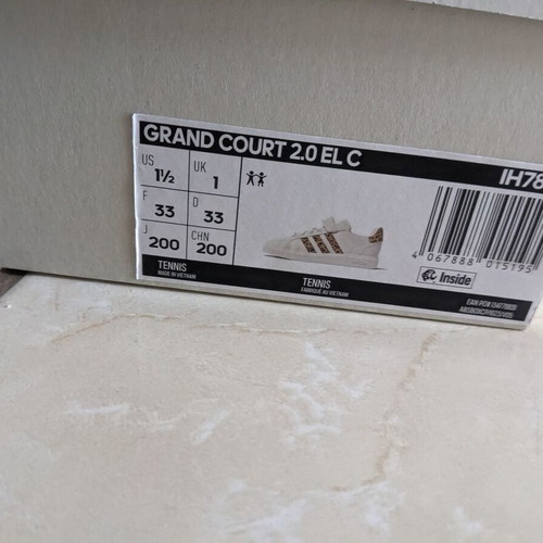Adidas kids athletic shoes used with leopard design size 33 white