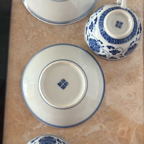 Chinese porcelain tea cups with saucers, white and blue decoration