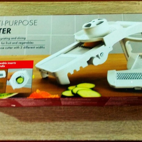 Multi-Purpose Grater new with accessories for slicing and shredding