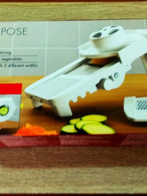 Multi-Purpose Grater new with accessories for slicing and shredding
