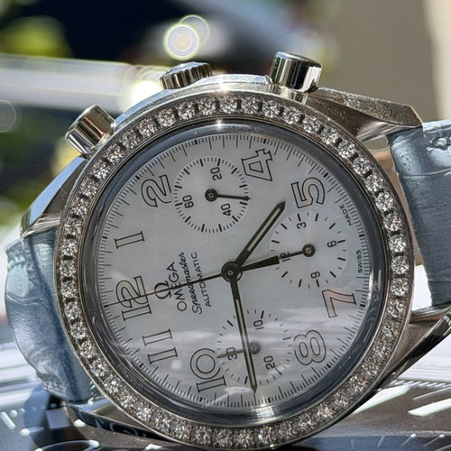 Omega Speedmaster 3835.70.36 watch like new, multicolor turquoise