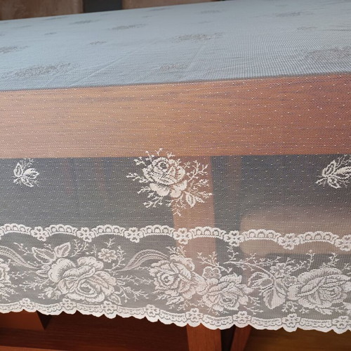 Transparent tablecloth used, light pink with rose patterns