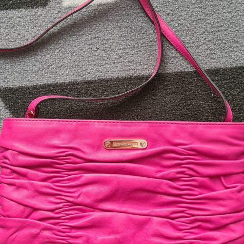 Michael Kors fuchsia crossbody bag used