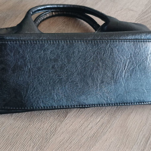 Handbag new with strap, black synthetic leather