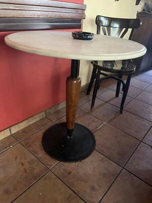 Marble indoor tables used with cast iron and wood base