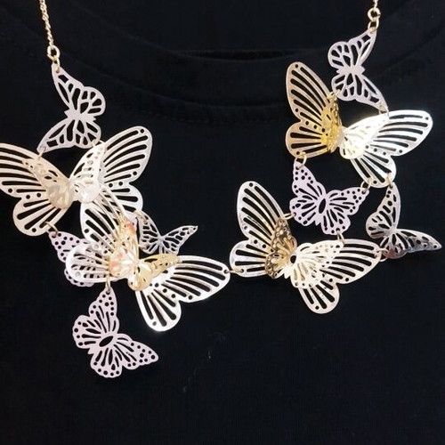 Necklace with butterflies like new in gold and silver