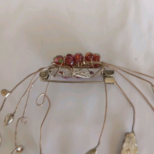 Handmade pin like new, gray, with movable twigs