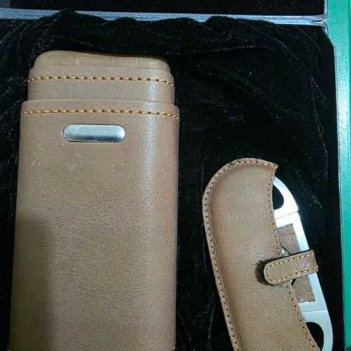 Luxury cigar accessory set with leather case and cutter