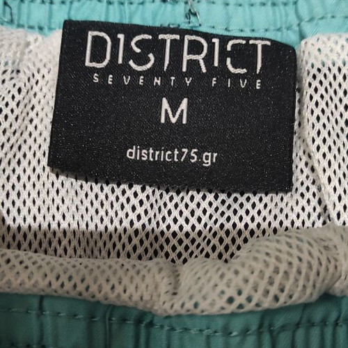 District swim shorts used, black and turquoise, size M, defect