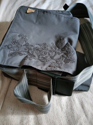 Lassig changing bag used, messenger with strap and spacious compartments