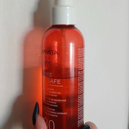 Apivita body tanning oil used with SPF30