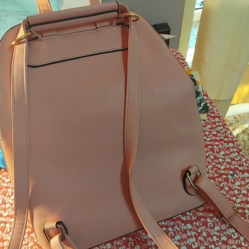 Women's backpack like new, adjustable straps, white and pink