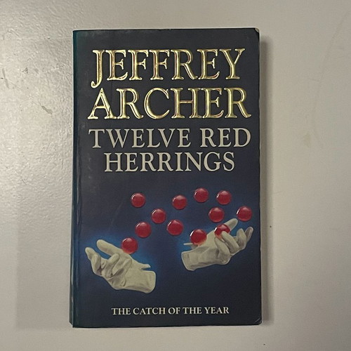 Twelve Red Herrings by Jeffrey Archer paperback like new