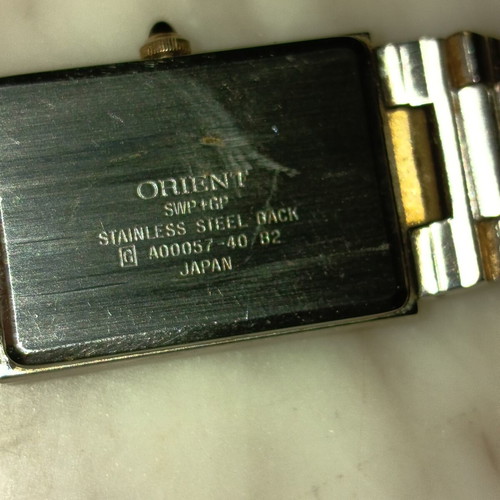 Orient quartz women's watch like new, gold and silver