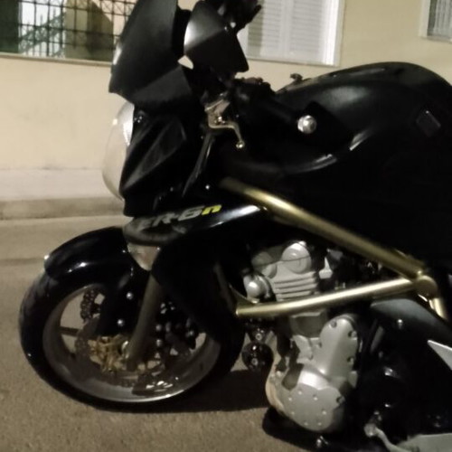 Kawasaki ER6 650cc motorcycle, 66000km, leather accessories