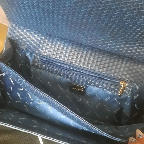 Axel clutch bag like new, blue with straw texture