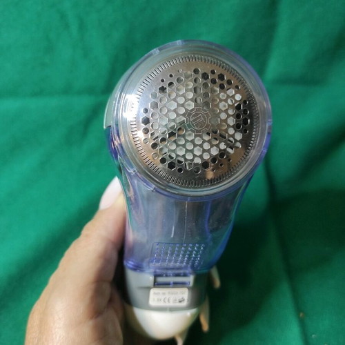 Crown fabric lint remover used, battery operated