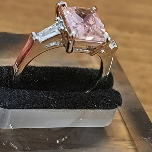 Ring with pink rectangular zircon and silver plating