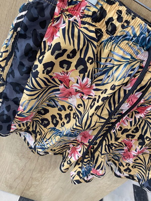 Floral swimsuit like new in camel, grey, black tones, size M