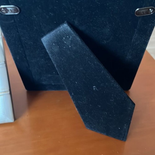 Set of 4 photo frames and 1 small album