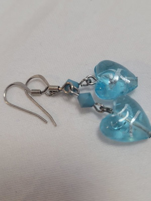 Handmade earrings with small blue hearts