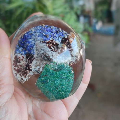 Glass ornament with beautiful blue flowers