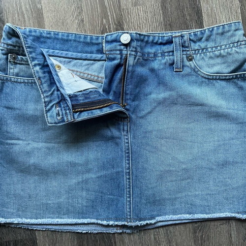 Benetton denim mini skirt with raw hem like new, size M/L