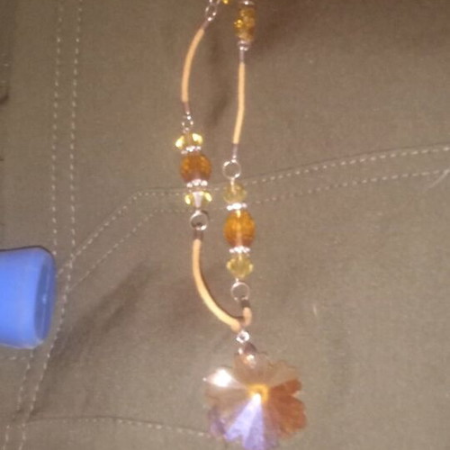 Handmade necklace with amber beads and leaf pendant