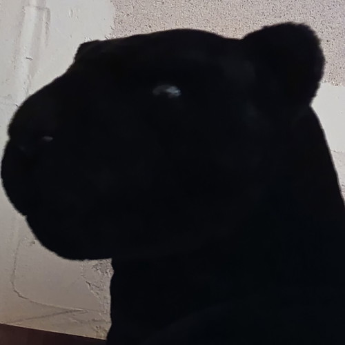 Large plush black panther with blue eyes, like new