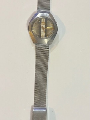 Orient women's watch used with broken bracelet, silver